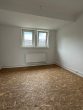 Wohnzimmer - Gemütliche Dachgeschosswohnung im grünen Umfeld